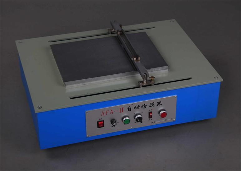Automatic film applicator machine